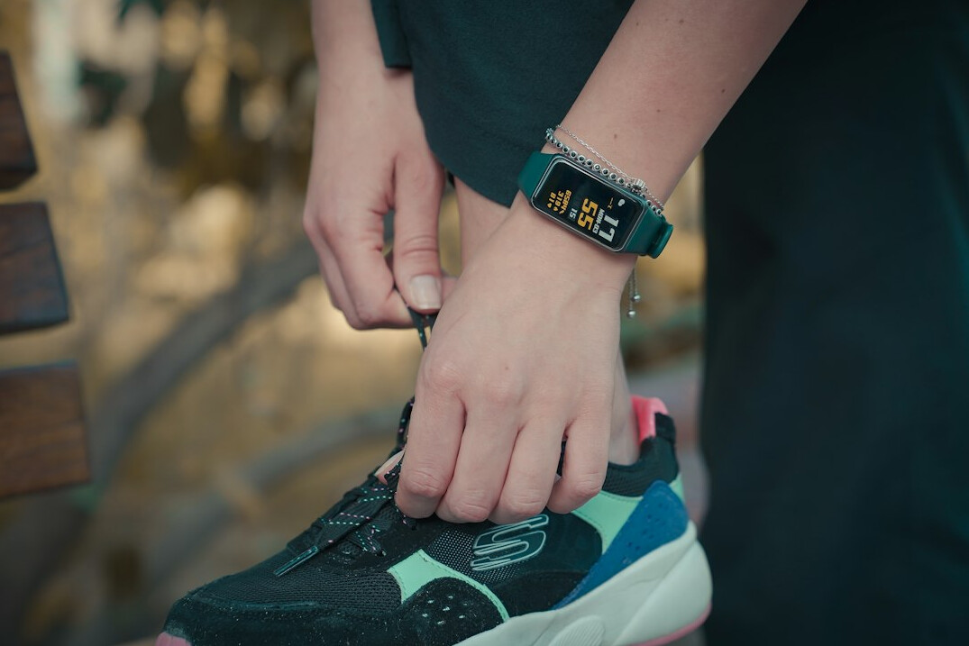 person tracking fitness on smartwatch