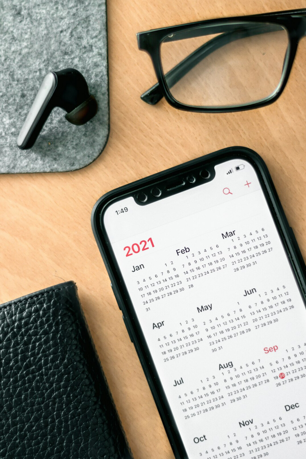 person checking calendar on phone